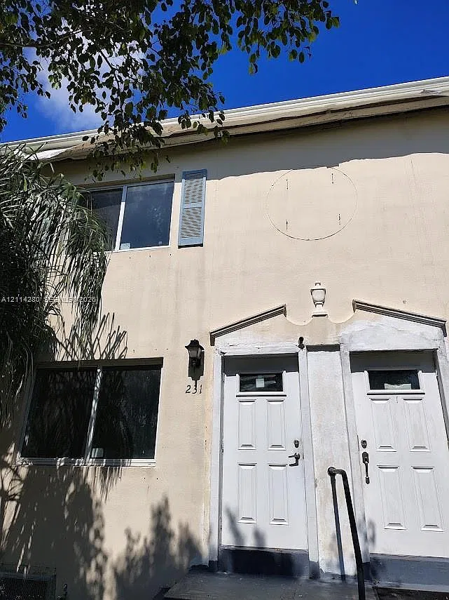 Sunset Palm Villas Condo — Photo 1