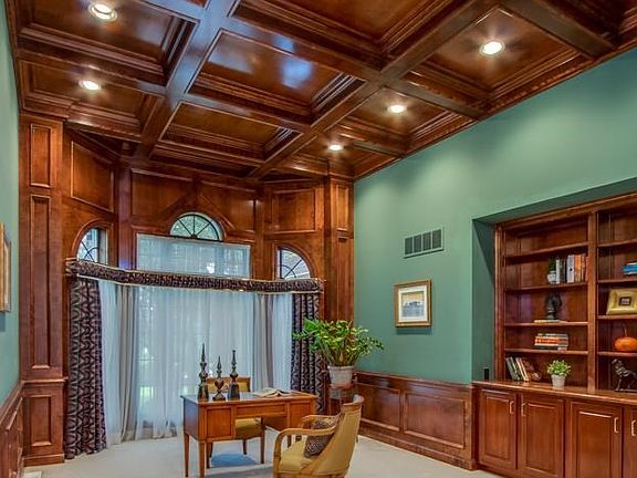 Sophisticated mill work in this beautiful den.