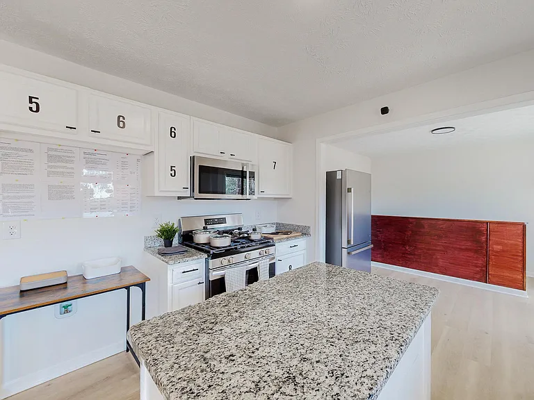 Dedicated Storage in Cabinets and 2 Refrigerators!