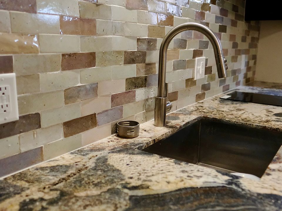 Morrocan tile backsplash and granite countertop