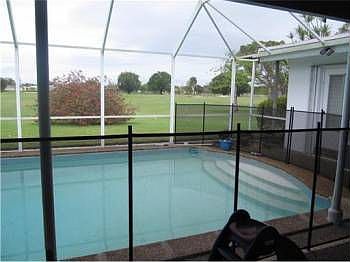 2nd image of 9711 Palmetto Club Ln W