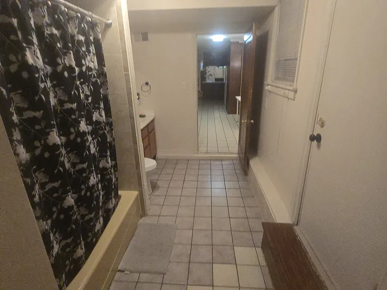 Looking from the Bath to the Front Door
