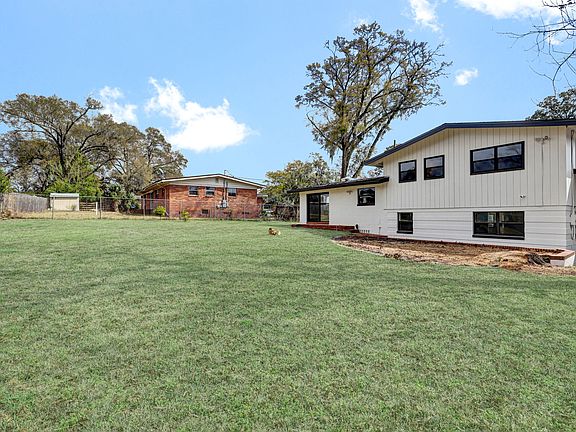Back View from backyard - third entrance, sliders in Dining Room