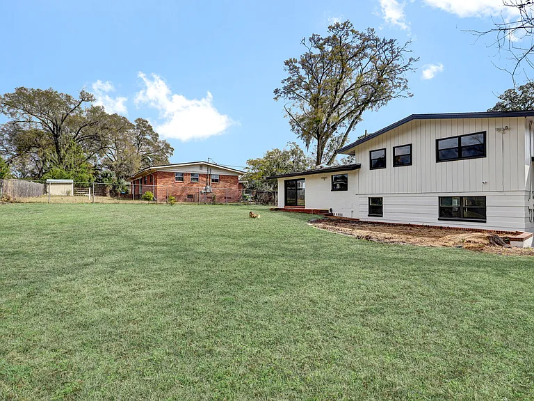 Back View from backyard - third entrance, sliders in Dining Room