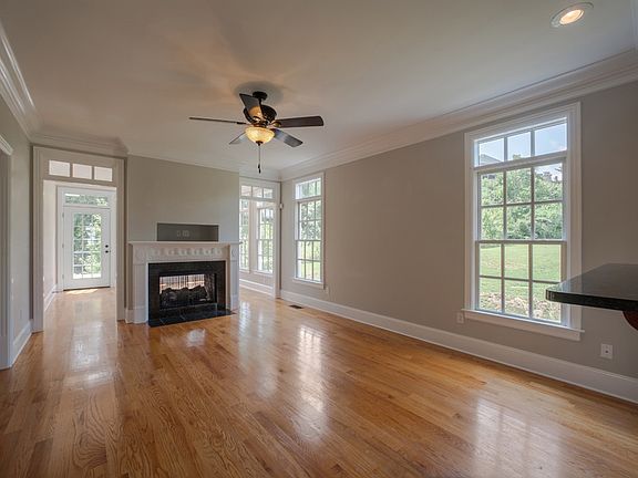 Large den with hardwood floors & gas fireplace....