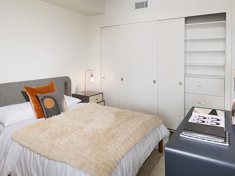 Stunning bedroom with custom closet