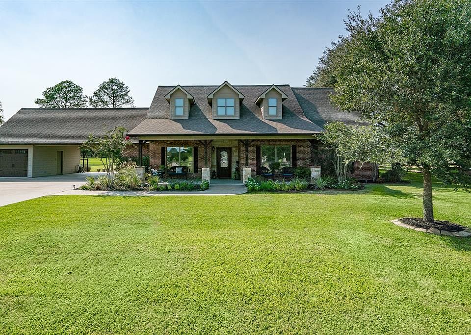 Welcome home to 15531 Sandtrap Drive nestled on an 1/2 acre lot in the community of Sky Lakes in Waller.