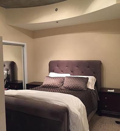 Bedroom with 3/4 wall, no door