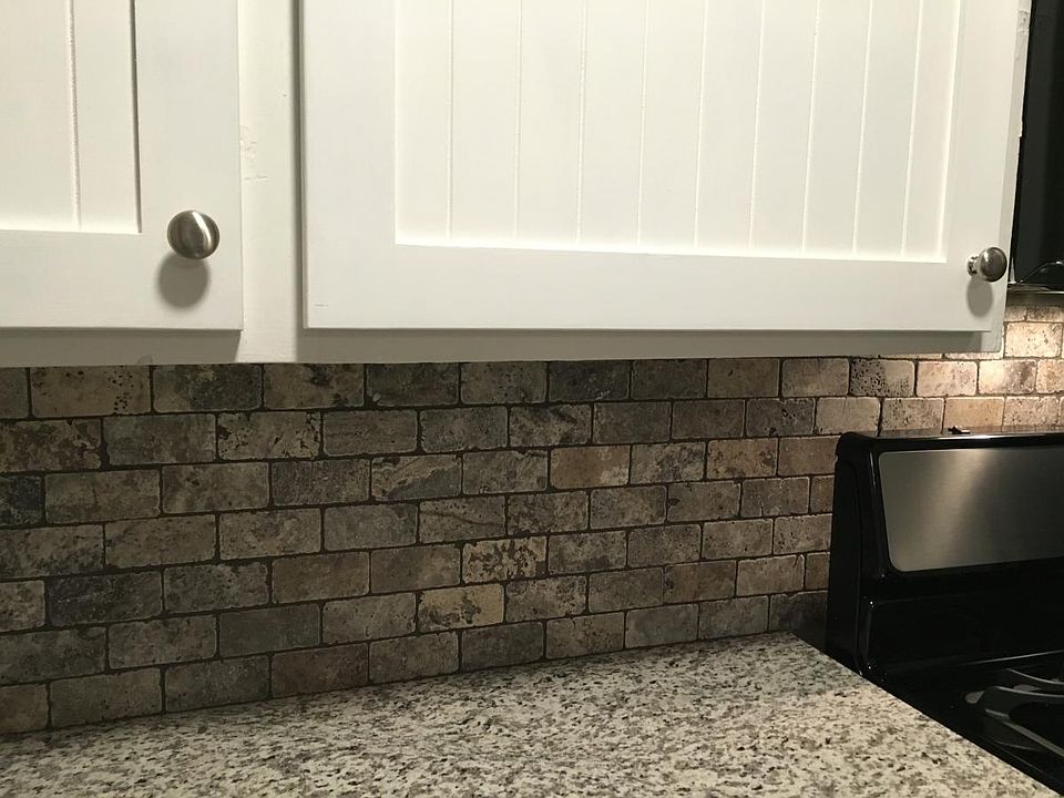 tumbled marble backsplash