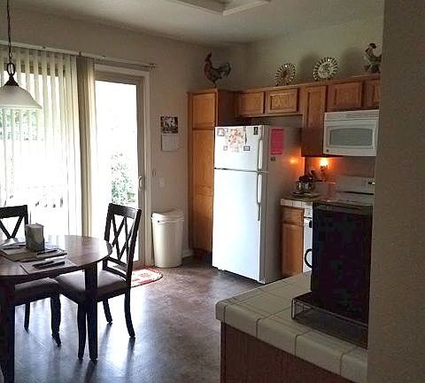Kitchen w/Refrigerator and Furnishings