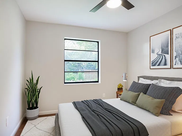 Bedroom 2. This image shows a virtually furnished space. Bedrooms come unfurnished.