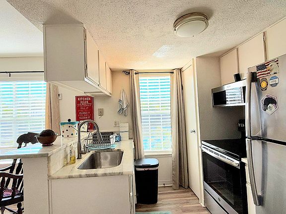 4th image of 9100 Dr Martin Luther King Jr St N APT 313