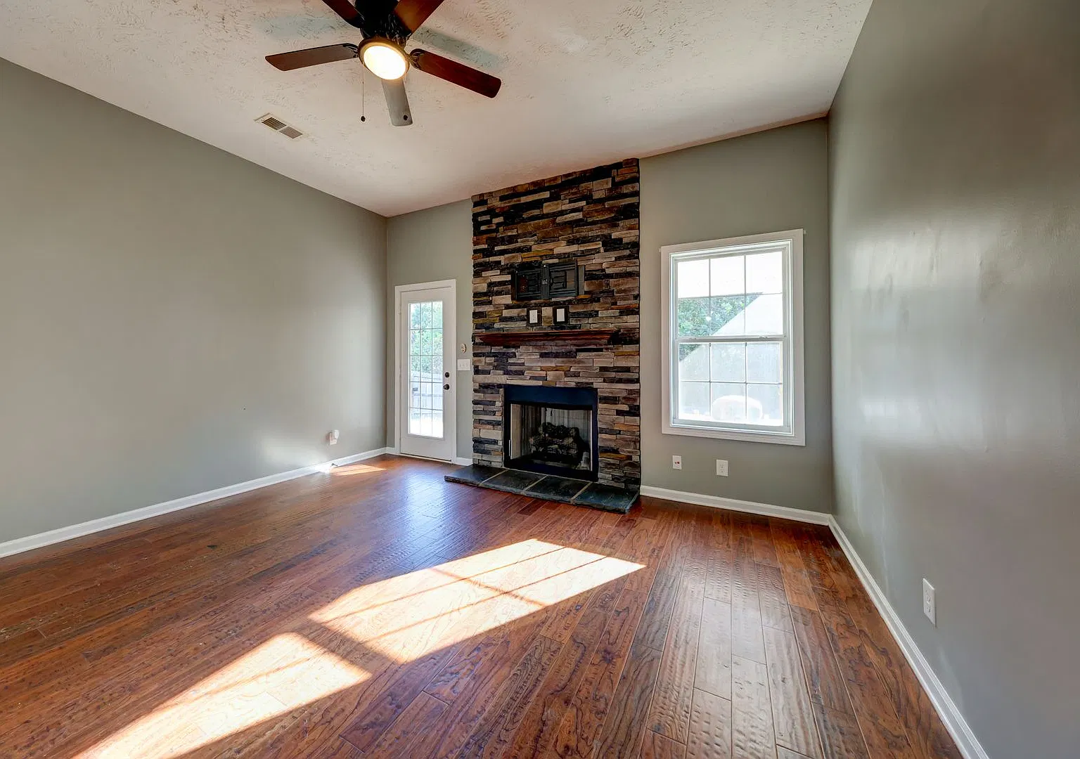 Inviting Home with Fireplace & Fenced Backyard — Photo 2