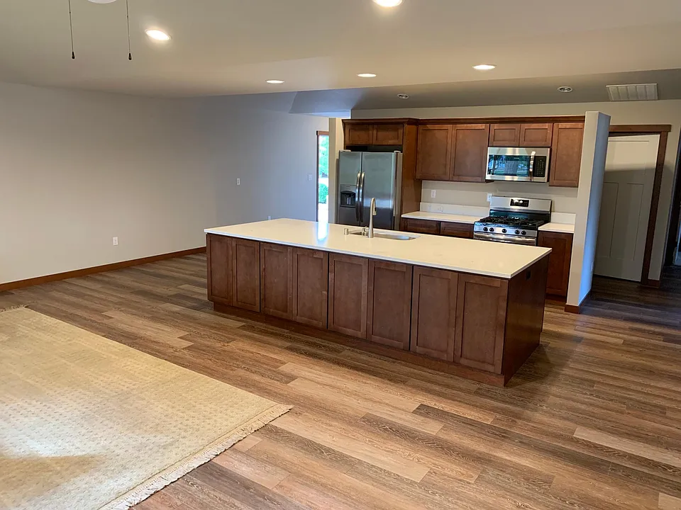 Open floor plan with spacious kitchen.