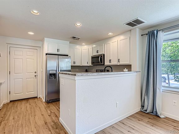 4th image of 8802 E 55th Avenue