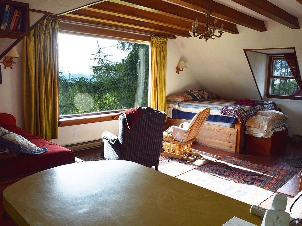 Looking from the upstairs breakfast nook island towards the