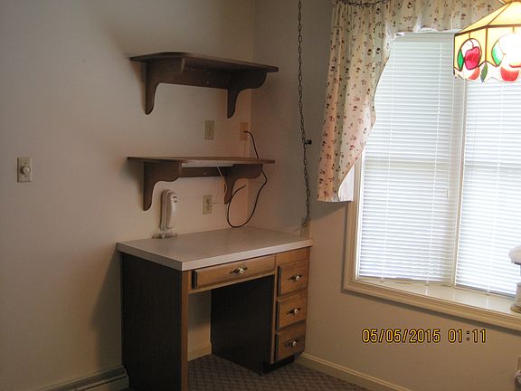 Kitchen w/desk, shelfs