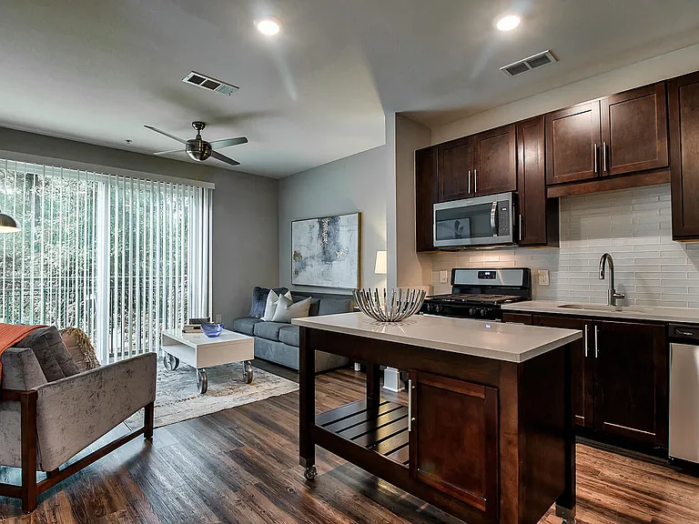 Our contemporary kitchens feature moveable islands with quartz counters