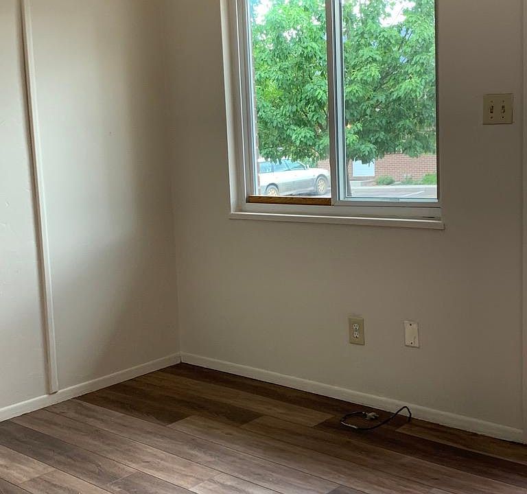 Living room with new floors and fresh paint