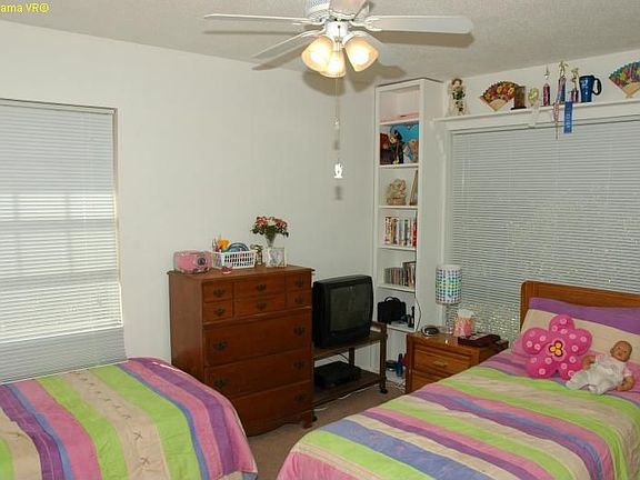 Bedroom 2 - large window w/built-in bookcases