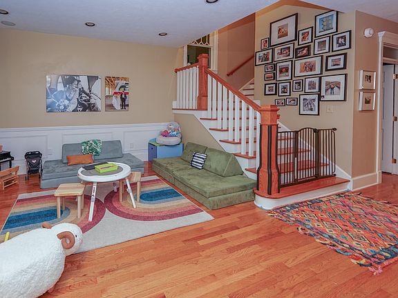 Entry from front door, second sitting area, and powder room