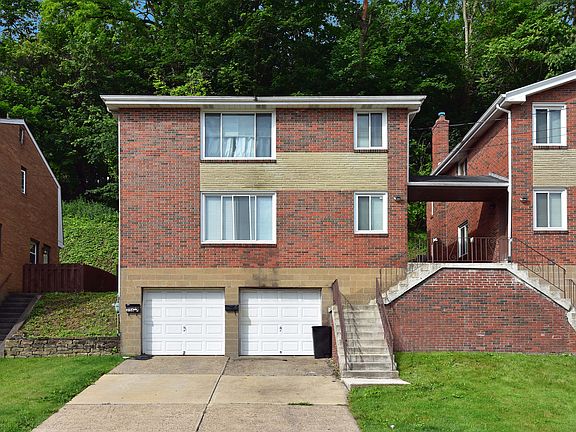 Available unit is on first floor above garage.