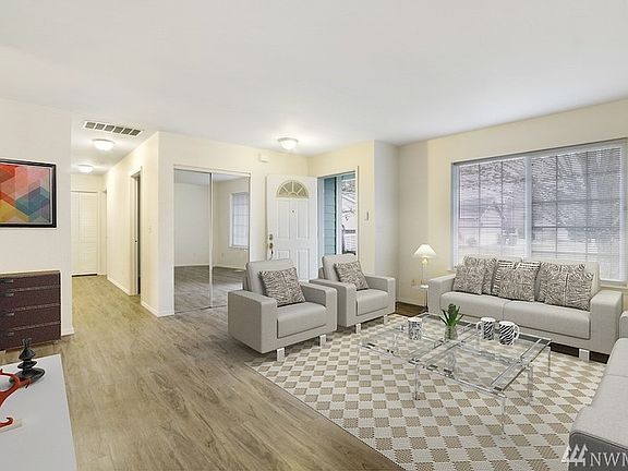 There are so many options for comfortable living with this fantastic floor plan. The living room makes a great media room or formal space for relaxing. *photo virtually staged*