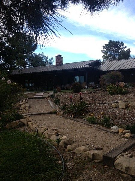 Front entry to the ranch house : Front walkway to the house from the barn