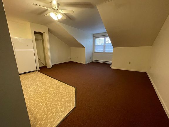 Open concept living room / kitchen / dining