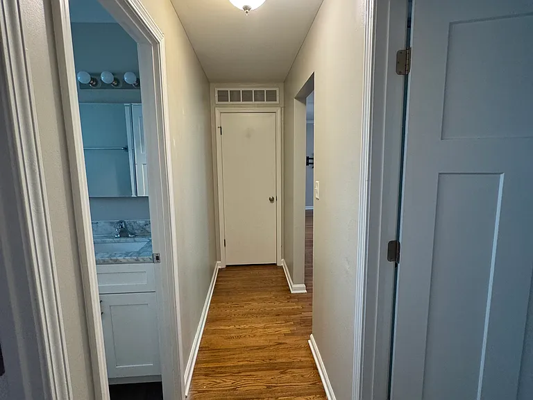 Hallway with coat closet