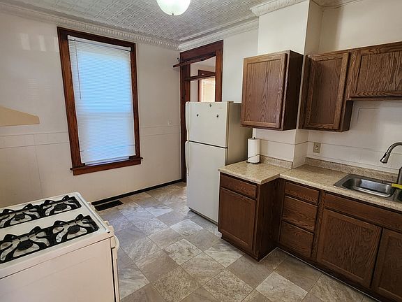 Large Eat-In Kitchen with Original Tin Ceiling
