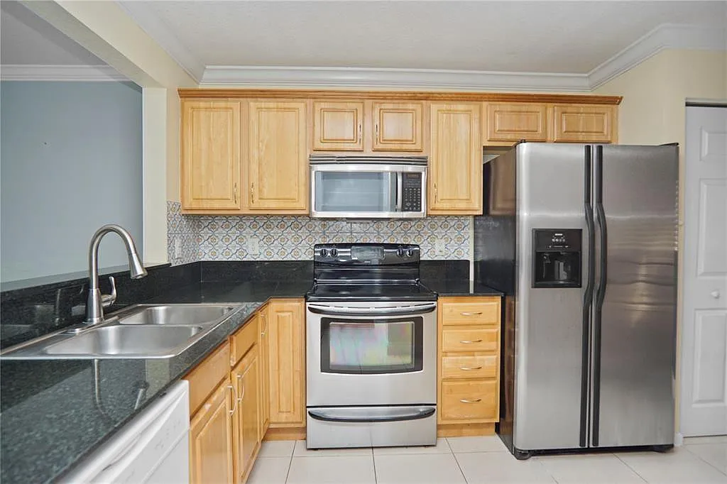 Building Photo - 6617 Winfield Blvd #4-1