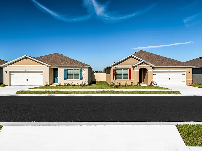 Charming single-story homes with private driveways and manicured lawns.