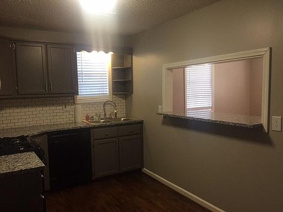 Kitchen pass thru bar to dining room
