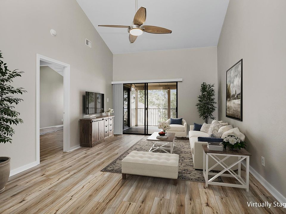 THIS LIVING ROOM IS VIRTUALLY STAGED BUT READY FOR YOUR TOUCH! FRESH PAINT FLOORING GRANITE, FIXTURES,