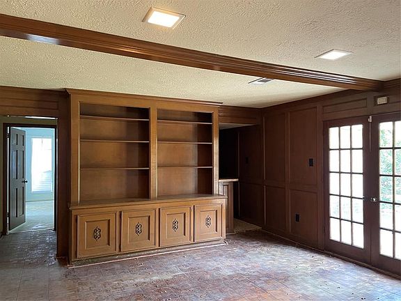 Built-in cabinets in den.
