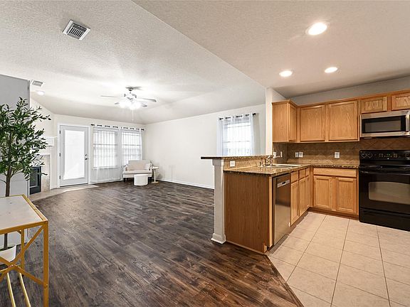 4th image of 9707 Misty Vine Ct