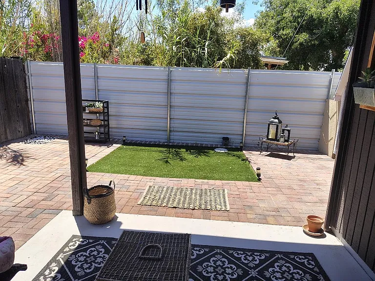 Spacious and cozy outdoor area. To the right, the shed and washer + dryer.