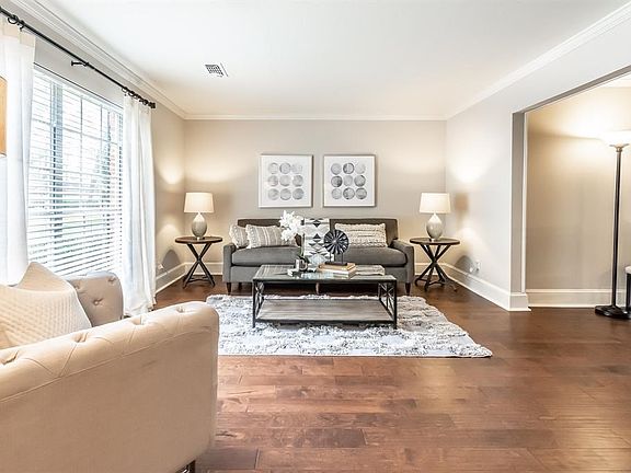 It's easy to stay connected in this open floor plan. The formal living opens into the family room.