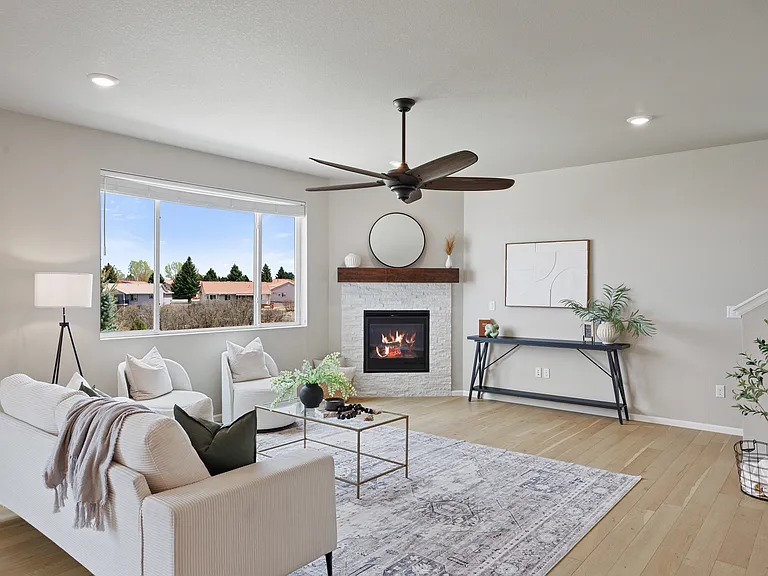 Open airy great room wih views and cozy fireplace