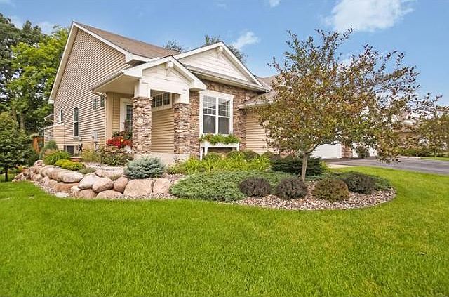 A lovely twinhome - inside and out. GREAT landscaping!