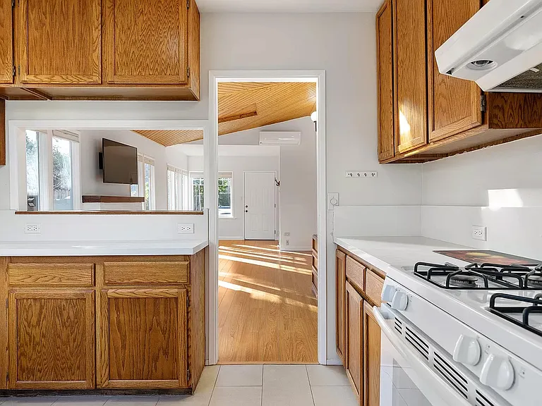 Kitchen with pass through window.