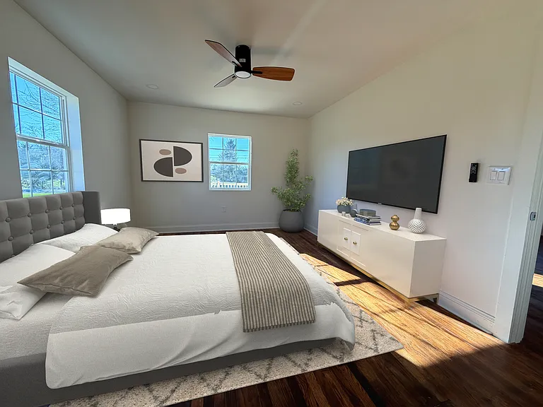 Digitally staged primary bedroom