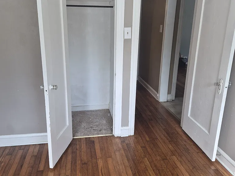 Front Bedroom with closet door open