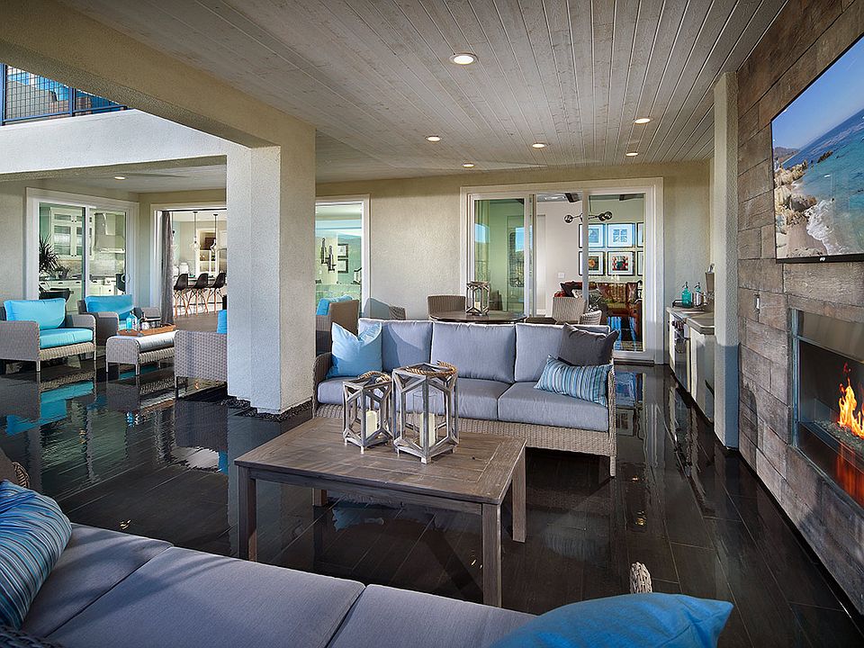Arista At Aliento Plan 3 Model Home Backyard Covered Patio And Fireplace