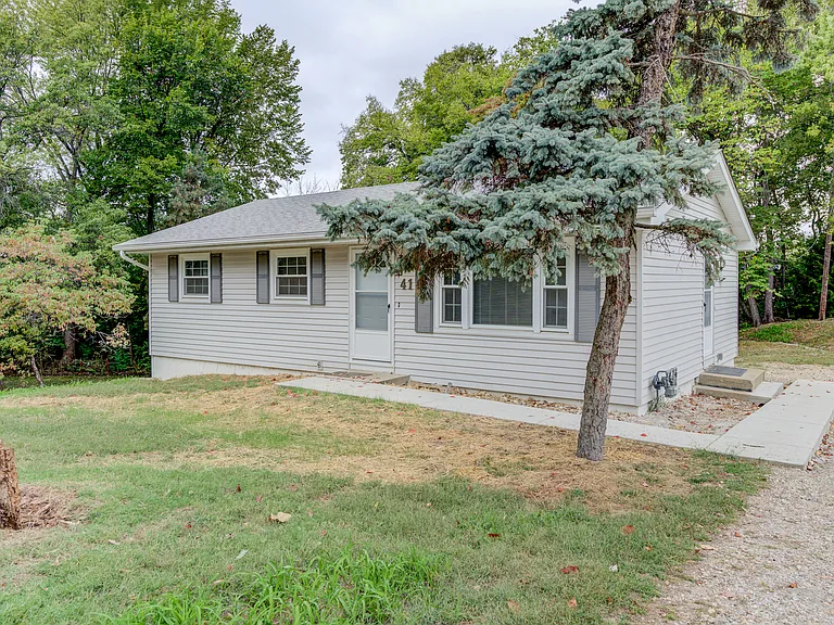 You are going to love this home - backs and sides to woods but in a REALLY convenient location.