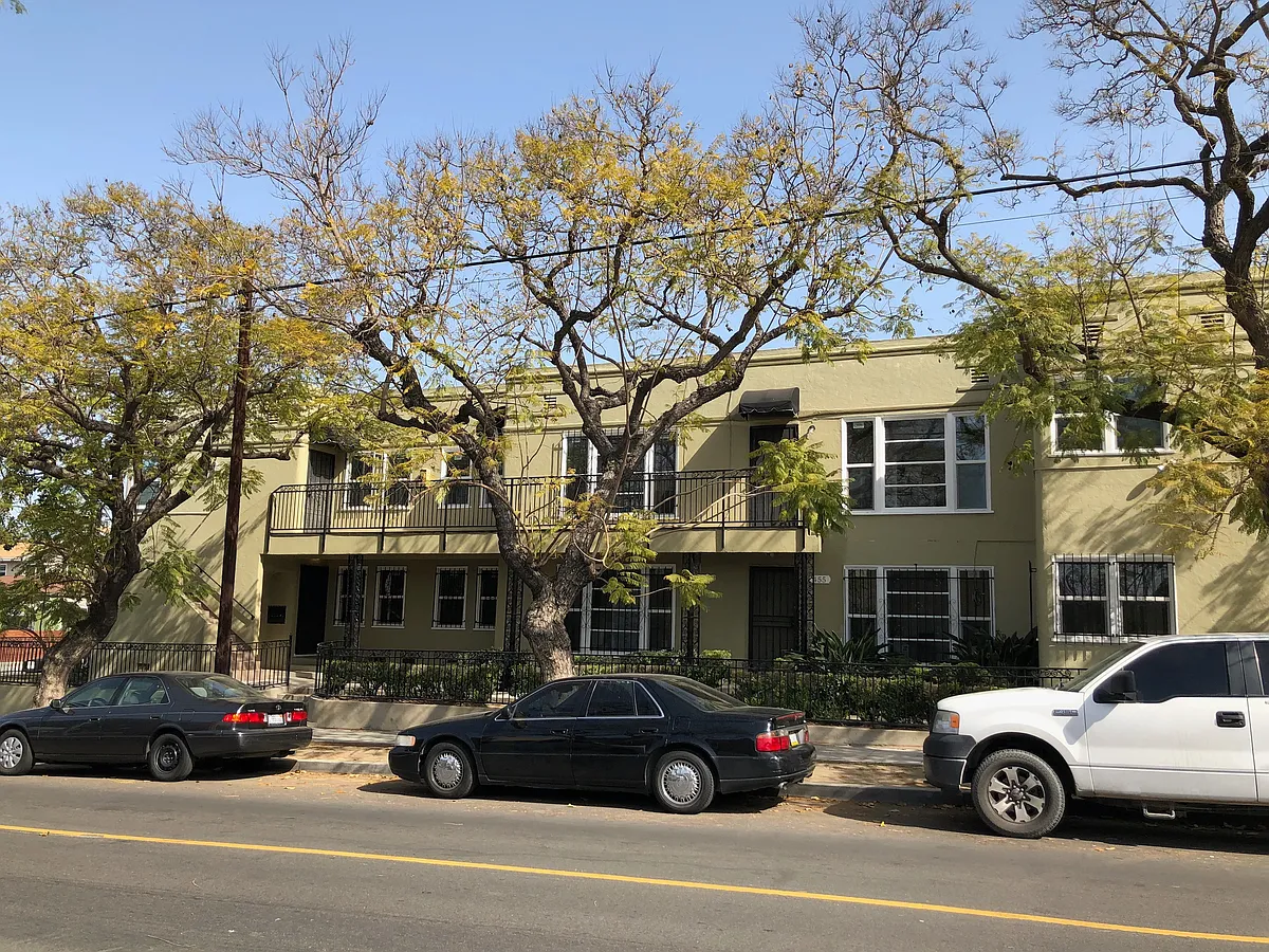 Two story apartment building exterior - 455 W 20th St