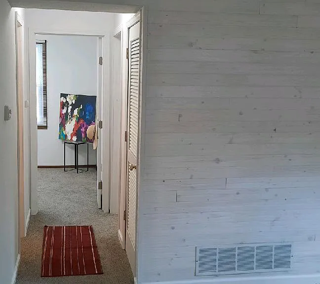 ...a short hallway separates the bathroom and bedrooms from the living spaces for convenience and privacy...the unit furnace and water heater are hidden in a small, hall utility closet...