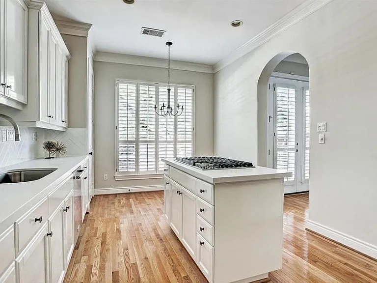 Bright kitchen with natural light with plenty of cabinet and storage space for all your cooking appliances