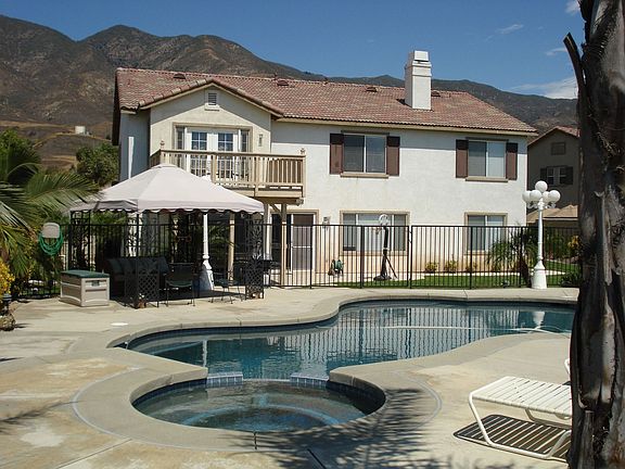 Backyard also has large grassy play space - great for entertaining!